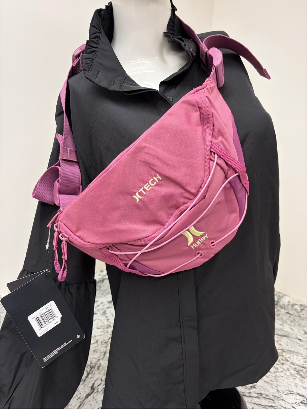 Hurley Pink Crossbody Sling Bag with Gold Logos and Straps